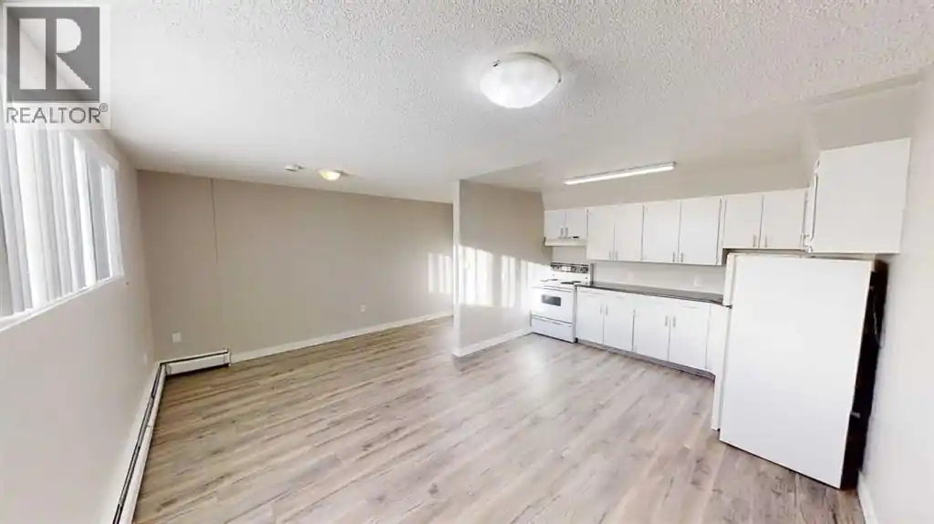 107, 9932 105 Avenue