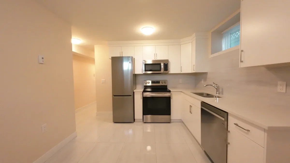 2 - 1525 E 55th Ave