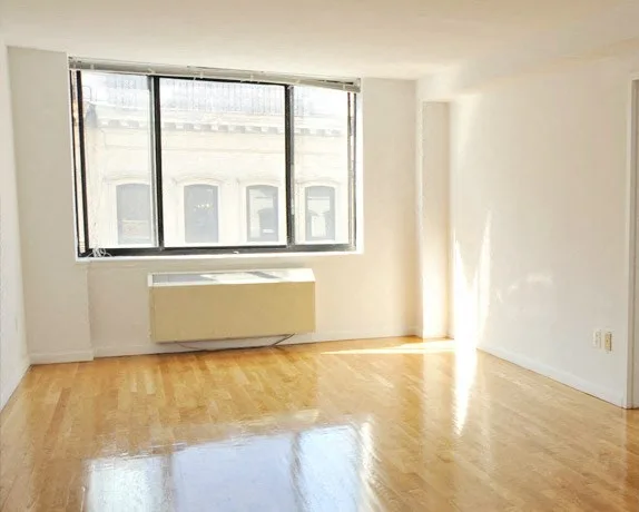 207-215 E 27TH ST