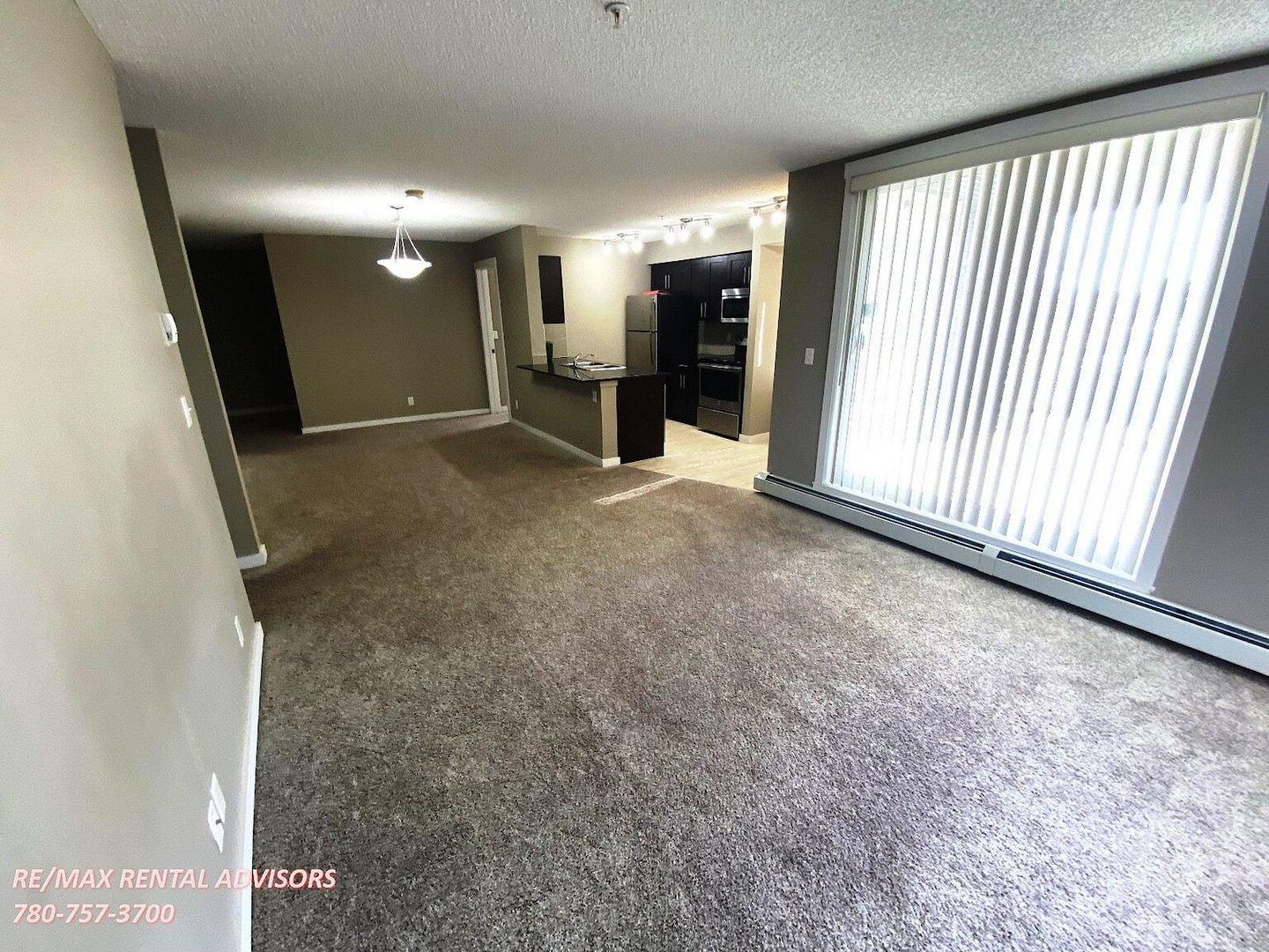 SPACIOUS 2 BED 2 BATH + DEN GROUND FLOOR CORNER APARTMENT W/AN OUTDOOR & UNDERGROUND PARKING STALL IN THE COMMUNITY OF W
